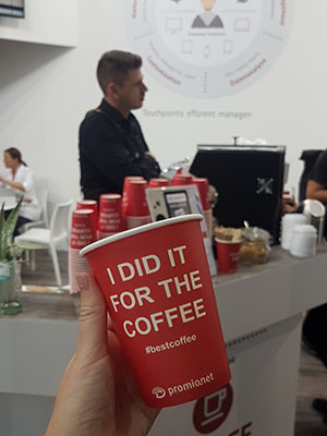 Free coffee at the booth of promio.net GmbH at DMEXCO 2018