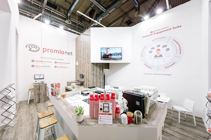Interior view of the promio.net booth design at DMEXCO 2018
